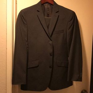 Kenneth Cole suit.